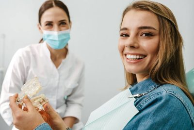 european-mid-happy-dentist-woman-showing-teeth-imi-2021-09-03-14-07-16-utc.jpg